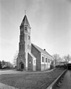 Exterieur overzicht toren en kerk, zuidwestgevel, toren met achtkantige bekroning met tentdak. - Elim - 20322391 - RCE -  Nederlands Hervormde Kerk: Exterieur overzicht toren en kerk, zuidwestgevel, toren met achtkantige bekroning met tentdak. (opmerking: Monumenten In Nederland Drenthe) 
