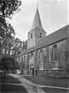 Zuidgevel, ingang met gevelsteen - Diever - 20057433 - RCE -  Nederlands Hervormde Kerk: Zuidgevel, ingang met gevelsteen (opmerking: In: Buiten ; 14(1920), nr. 7, p. 77) 