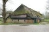 Boerderij onder rieten schilddak
