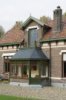 Overzicht uitgebouwde serre met gemetselde borstwering
