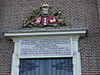 Urk tekst zijkant - Kerkje aan zee in Urk bord aan de zijkant