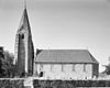 Overzicht zuidgevel met vrijstaande kerktoren en kerkhof - Surhuizum - 20345892 - RCE -  Hervormde Kerk: Overzicht zuidgevel met vrijstaande kerktoren en kerkhof (opmerking: Gefotografeerd voor Monumenten In Nederland Friesland, bladzijde 74) 