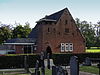Gebouw naast de kerk.JPG