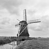 Watermolen van de Hempensermeer, wiekenhuis en windpeluw slecht. - Warga - 20249670 - RCE -  watermolen van de Hempensermeer, wiekenhuis en windpeluw slecht. 