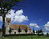 Ginnum.JPG -  Ginnum EÃ©n van de twaalf dorpen in de gemeente Ferwerderadiel in het hoge noorden van FryslÃ¢n. Ginnum heeft ongeveer 100 inwoners. Het bezit een mooi oud kerkje uit de 12e Eeuw. Eigenaar is de Stichting Alde Fryske Tserken. De kerk is in gebruik als museum en atelier. De kerk ligt prachtig in het landschap op een terp. 