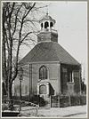Voorzijde van de N.H. kerk te Sint Annaparochie - Sint Annaparochie - 20319309 - RCE -  Nederlands Hervormde Kerk: Voorzijde van de N.H. kerk te Sint Annaparochie (opmerking: Op achterzijde deel van toelichtende tekst) 