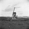 Spinnenkopmolen in vervallen toestand schuin van opzij gefotografeerd - Marssum - 20151202 - RCE -  Terpzigt: Spinnenkopmolen in vervallen toestand schuin van opzij gefotografeerd 