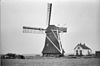 Poldermolen schuin van achteren gefotografeerd - Marssum - 20151197 - RCE -  De Marssumermolen: Poldermolen schuin van achteren gefotografeerd 