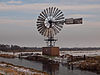 American style windmotor -  This American style wind motor was originally build in 1926 about a mile from it's current location. It was dismantled back in 1991 and rebuild / restored about a decade later.