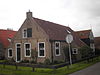 Boerderij Formerum 81 op Terschelling -03 -  Farmhouse dating 1882 with lower wall, Formerum 81 on the island of Terschelling in the Netherlands. Nationally listed heritage.  Boerderij uit 1882 met laagwand, Formerum 81 op Terschelling.
