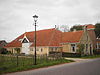 Boerderij voorhuis met gevel met zesruitsvensters op de beganegrond en met excentrisch topvenster