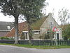 Admir in Lies op Terschelling -02 -  Admir, dated 1662, known as the oldest farm on the island of Terschelling, inside completely rebuilt into summer home. Two whale hook as fence posts. FaÃ§ade with arches over the windows. Windows with six panes.  Admir, gedateerd 1662, bekend als oudste boerderij van Terschelling, inwendig geheel verbouwd tot zomerwoning. Twee walvishaken als hekpalen. Voorgevel met bogen boven de vensters. Vensters met 6 ruiten.