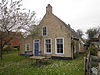 Bocht van de Parel in Lies op Terschelling -02 -  Small farmhouse with six paneled windows at Liezinger Zuidweg 3 on the island of Terschelling in the Netherlands. Nationally listed heritage.  Boerderijtje met zesruitsvensters, Liezinger Zuidweg 3.