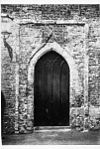 West ingang van het noord portaal, reproductie van foto - Bolsward - 20037499 - RCE -  Martini- of N.H.Kerk: west ingang van het noord portaal, reproductie van foto 