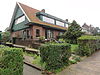 Rijtje van tien middenstandswoningen
