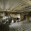 Interieur, overzicht van de oorspronkelijke keuken in het souterrain