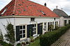 Boerderij onder pannen schilddak
