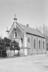 Voor- en zijgevel van de voormalige synagoge te Culemborg - Culemborg - 20051663 - RCE -  Voormalige synagoge: Voor- en zijgevel van de voormalige synagoge te Culemborg 