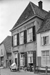 Pand onder hoog schilddak