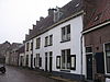 Laat gotisch pand, onder een zadeldak met de nummers 11 en 13