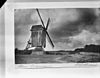 Standerdmolen, de ruigheid van riet en ongeverfd hout komt goed tot uitdrukking; reproductie naar oude foto - Doesburgerheide - 20058410 - RCE -  Diversen: Standerdmolen, de ruigheid van riet en ongeverfd hout komt goed tot uitdrukking; reproductie naar oude foto 
