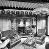 Interieur woonkamer met schouw - Lunteren - 20143089 - RCE -  interieur woonkamer met schouw 
