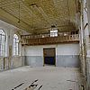 Leegstaande gebedsruimte met plaatijzeren plafond en vrouwengalerij in de voormalige synagoge te Lochem - Lochem - 20277480 - RCE -  Voormalige synagoge: Leegstaande gebedsruimte met plaatijzeren plafond en vrouwengalerij in de voormalige synagoge te Lochem 