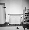 Interieur kamer, schouw met radiator - Lochem - 20327488 - RCE -  Interieur kamer, schouw met radiator 