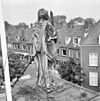 Voorgevel, bovenop de ingangspartij, beeld van Vrouwe Justitia van Ingatius van Logteren - Wageningen - 20348356 - RCE -  Stadhuis: Voorgevel, bovenop de ingangspartij, beeld van Vrouwe Justitia van Ingatius van Logteren 