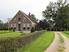 Kreunenhuis met schuur -  Kreunenhuis met schuur aan de Wooldseweg 127 in Winterswijk-Woold