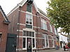 Te Kortschot - pakhuis -  Zijaanzicht van Winkelpand Te Kortschot: het volledige rijksmonument beslaat Ratumsestraat 10 (woning), 12 (winkel) en 12a (winkel)