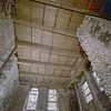 Woontoren- gezicht omhoog met nooddak uit 1966 - Nederhemert-Zuid - 20340515 - RCE -  Kasteel Nederhemert: Woontoren, begane grond vanaf de scheidingsmuur zaal / woontoren: gezicht omhoog met nooddak uit 1966 (opmerking: Gefotografeerd in het kader van Kanjerproject) 