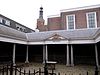 Vismarkt Vishal - In 1766 door C. van Leeuwen gebouwde vishal, bestaande uit drie vleugels rond een binnenpleintje, dat door een ijzeren hek van de straat gescheiden wordt. De drie vleugels worden gedekt door schilddaken en zijn naar het pleintje geopend als galerijen met hardstenen dorische zuiltjes, die een houten hoofdgestel dragen. De middentravee van de terugliggende vleugel draagt een houten fronton met het stadswapen en het jaartal 1776. 