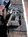 De Onderneming (Vierhuizen) windshaft lightning conductor.JPG -  Windmill De Onderneming (Vierhuizen). Tail end stone bearing and lightning conducter pickups on the windshaft