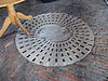 De Onderneming (Vierhuizen) millstone.JPG -  Windmill De Onderneming (Vierhuizen). Millstone with holes pattern of dress on the ground floor.