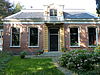 Godlinze - hervormde pastorie - voorzijde -  Voorzijde van de hervormde pastorie van Godlinze.
