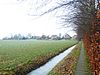 Versterkte dorpswierde met resten van het benedictijnenklooster Sint Juliana