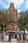 Winkelmagazijn met bovenwoning