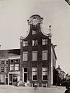 Voorgevel en zicht in straat - Groningen - 20328382 - RCE -  Lodewijk-XIV-stijl/ Winkel: Voorgevel en zicht in straat (opmerking: Uit nalatenschap Alexander) 