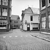 Overzicht Hoge der A - Vishoek - Groningen - 20092254 - RCE -  De hoek Vishoek-Visserstraat in Groningen, gezien vanaf de Hoge der A in 1980. V.l.n.r. een deel van Hoge der A 36, de achtergevel van De Sleutel (Noorderhaven 72, rm 18599), Visserstraat 63 en een deel van Hoge der A 35 (rm 18530). 