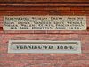Armhuiszitten Convent - steen 1634-1884 -  Twee gevelstenen in de voorgevel van het Armhuiszitten Convent in de stad Groningen (Nederland).