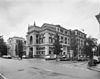 Voor- en rechter zijgevel - Groningen - 20093322 - RCE -  Het Praedinius Gymnasium (links, rm 486483) en de voorgevel en zuidelijke zijgevel van de Stadsschouwburg (rm 486489), Turfsingel, Groningen, 1980. Rechts de Kruitlaan. 