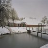 Overzicht boerderijcomplex met brug vanuit het zuiden