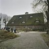 Overzicht van de lange gevel van de schuur