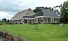 Niebert - 't Pad 4 -  Boerderij met dwarshuis onder schilddak aan 't Pad 4 in Niebert (Marum, Groningen, Nederland). Gebouwd tussen 1851 en 1852.