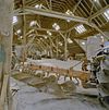 Interieur, overzicht schuur met landbouw werktuigen - Nieuweschans - 20334830 - RCE -  524390: Interieur, overzicht schuur met landbouw werktuigen 
