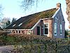 Midwolda - Hoofdweg 71 -  Keuterij met ondiep woongedeelte aan de Hoofdweg 71 van Midwolda (Groningen, Nederland).