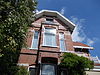 Herenhuis in Overgangsstijl met eclectische, Chalet- en Art Nouveaustijl-elementen 1904 - 2