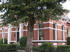 Herenhuis in eclectische bouwtrant met hek in Winschoten uit 1898 - 2