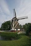 Slochteren - molen De Ruiten -  Slochteren: Molen De Ruiten, gezien vanaf de Groenedijk